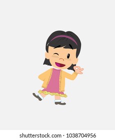 Asian girl doing the OK sign with his hand.