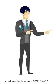 Asian groom indicating with two fingers to the side. Full length of groom in a wedding suit pointing with two fingers to the side. Vector flat design illustration isolated on white background.