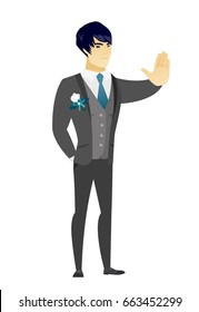 Asian groom two fingers showing stop hand gesture. Full length of young groom doing stop gesture. Serious groom with a stop gesture. Vector flat design illustration isolated on white background.