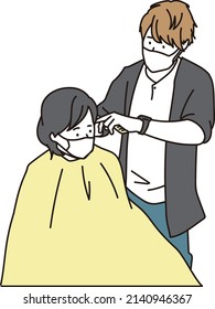 Asian hairdresser wearing a mask and doing a haircut