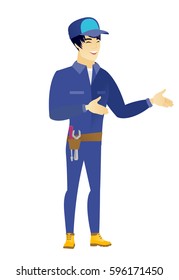 Asian happy mechanic gesturing. Full length of cheerful mechanic gesturing with his hands. Young mechanic laughing and gesturing. Vector flat design illustration isolated on white background.
