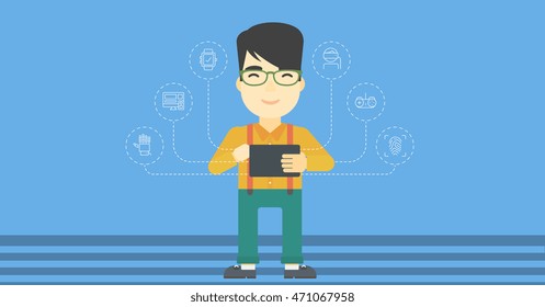 Asian happy student holding tablet computer. Young man working on tablet computer and some icons connected to the device on light blue background. Vector flat design illustration. Horizontal layout.