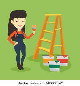 Asian house painter holding a paintbrush. House painter with paintbrush in hand standing near step-ladder and paint cans. Concept of house renovation. Vector flat design illustration. Square layout.