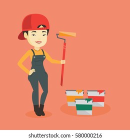 Asian house painter in uniform holding paint roller in hands. Young cheerful house painter at work. Smiling house painter standing near paint cans. Vector flat design illustration. Square layout.