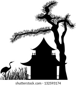 Asian house under a pine tree and a crane in the reeds, silhouette