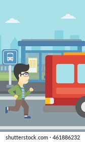 An Asian Latecomer Man Running Along The Sidewalk To Reach A Bus. Young Man Came Too Late At Bus Stop. Man Chasing A Bus. Vector Flat Design Illustration. Vertical Layout.