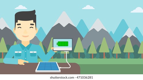 Un hombre asiático cargando una tablet con panel solar en el fondo de las montañas. Cargando tableta digital del panel solar portátil. Ilustración de diseño plana vectorial. Diseño horizontal.