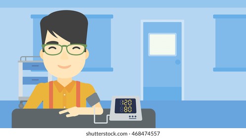Asian man checking blood pressure with digital blood pressure meter. Man taking care of his health and measuring blood pressure in hospital room. Vector flat design illustration. Horizontal layout.