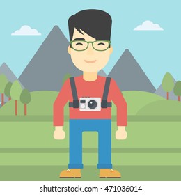 An asian man with a digital camera on his chest. Tourist with a digital camera standing on the background of mountains. Vector flat design illustration. Square layout.