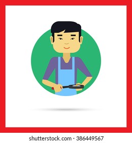 Asian man with frying pan