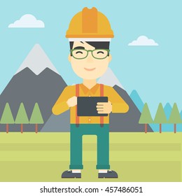 An asian man in hardhat holding a tablet computer in hands on the background of mountain landscape. Man working on digital tablet. Vector flat design illustration. Square layout.