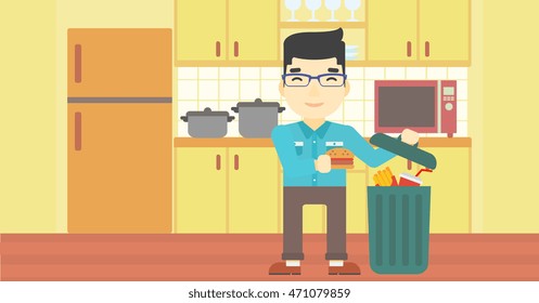 An Asian Man Putting Junk Food Into Trash Bin. Man Refusing To Eat Junk Food. Man Throwing Junk Food On The Background Of Kitchen. Diet Concept. Vector Flat Design Illustration. Horizontal Layout.