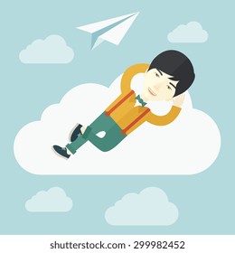 An asian man is relaxing while lying on a cloud with paper plane. A contemporary style with pastel palette soft blue tinted background with desaturated clouds. Vector flat design illustration. Square