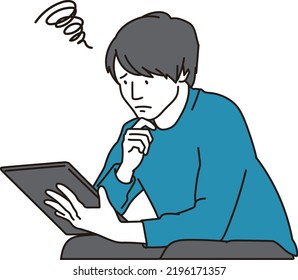 Asian man in trouble while looking at the tablet