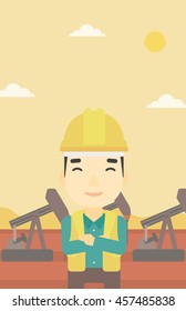 An asian oil worker in uniform and helmet. An oil worker with crossed arms. An oil worker standing on a background of pump jack. Vector flat design illustration. Vertical layout.