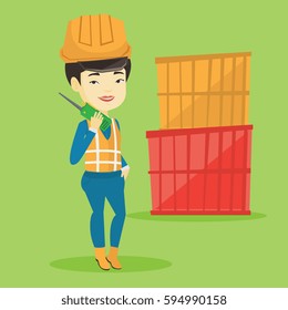 Asian port worker in hard hat talking on wireless radio. Port worker standing on cargo containers background. Smiling port worker using wireless radio. Vector flat design illustration. Square layout.
