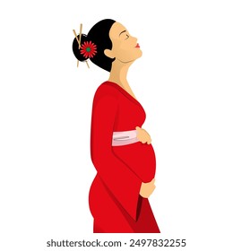 Asian pregnant woman side view in red kimono tenderly holds her belly with a happy smile