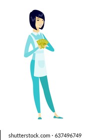 Asian smiling cleaner holding money. Excited female cleaner standing with money in hands. Full length of young cheerful cleaner with money. Vector flat design illustration isolated on white background