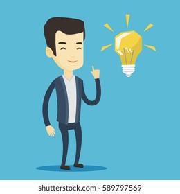 Asian student pointing his finger up at the idea light bulb. Young excited student with bright idea bulb. Smart smiling student having a great idea. Vector flat design illustration. Square layout.