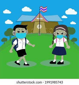 Asian students, boy and girls are walking to school. Both of them are wearing mask to protect the corona virus 19 as the government suggest. 