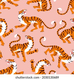 Asian Tigers modern pattern. Vector seamless pattern with a cartoon roaring tigers on pink background 