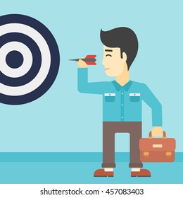 An asian young businessman with briefcase aiming at a target board. Concept of achieving of business goals. Vector flat design illustration. Square layout.