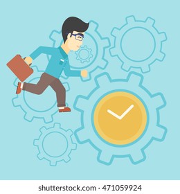An asian young businessman with briefcase running on a blue background with clock and cogwheels. Vector flat design illustration. Square layout.