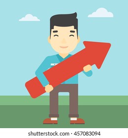 An asian  young businessman holding a big arrow in hands. Successful business concept. Vector flat design illustration. Square layout.