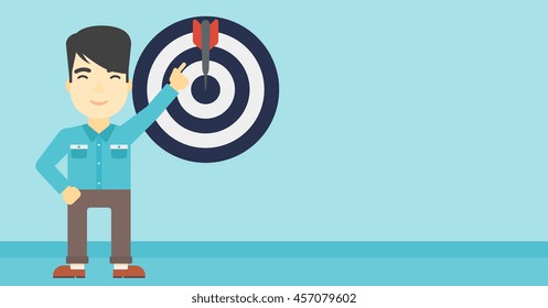 An asian young businessman pointing at arrow in a target board. Concept of achievement of business goal. Vector flat design illustration. Horizontal layout.