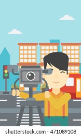 An asian young cameraman looking through movie camera on a tripod. Young man with professional video camera in the city. Vector flat design illustration. Vertical layout.