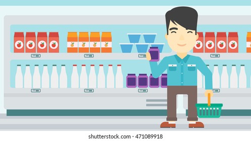 An asian young man holding shopping basket in one hand and milk product in the other. Male customer shopping at supermarket with basket. Vector flat design illustration. Horizontal layout.