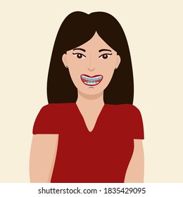 Asian young woman smiles with braces on her teeth. Advertising dentistry and a beautiful smile. The concept of care for the oral cavity