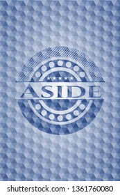 Aside blue emblem with geometric pattern.