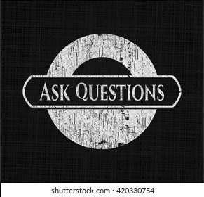Ask Questions written on a chalkboard
