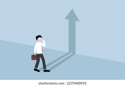 Aspiration for growth and success, career purpose, self motivation, belief in ability to improve and achieve concept, Businessman looking at his shadow on wall as rising arrow. 