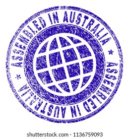 ASSEMBLED IN AUSTRALIA stamp watermark with distress texture. Blue vector rubber print of ASSEMBLED IN AUSTRALIA label with retro texture. Seal has words placed by circle and globe symbol.
