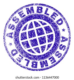 ASSEMBLED stamp watermark with grunge texture. Blue vector rubber print of ASSEMBLED tag with dust texture. Seal has words placed by circle and planet symbol.