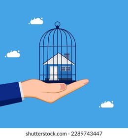 Asset control. Restrict or lock the house in the birdcage. business and investment concept