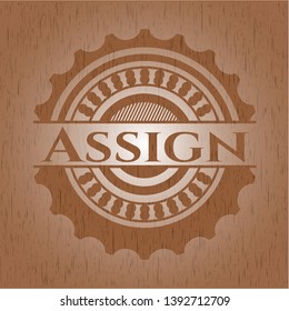 Assign badge with wooden background