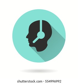 Assistance vector icon. Black illustration isolated on green background for graphic and web design.