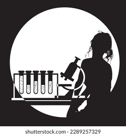 Assistant pathologist at his desk with a microscope and test tubes.