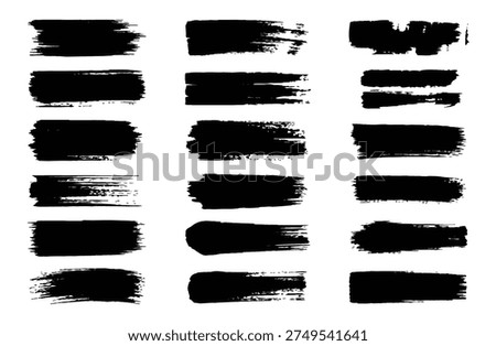 Assorted black brushstrokes create a textured, artistic pattern on a white background.