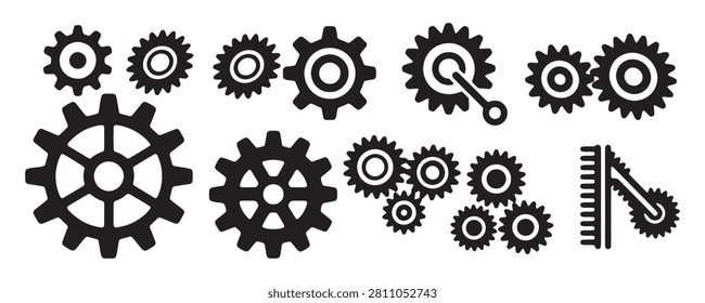 Assorted black silhouettes of machine gears sprockets and transmission systems for machinery design needs.