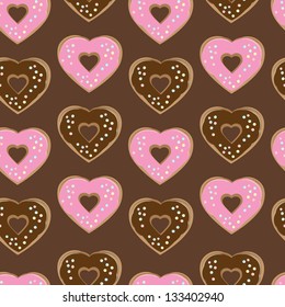 Assorted heart shaped doughnuts glazed with chocolate and pink icing topped with colourful sprinkles arranged in a seamless background pattern of repeat rows with alternating colours