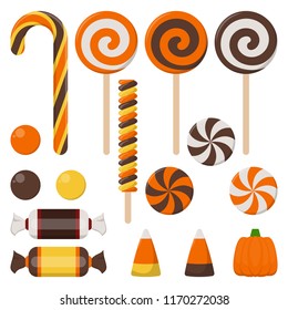 Assortment of Colorful Halloween Candy - Halloween candy including candy cane, lollipop, gum ball, wrapped candy, and more isolated on white background