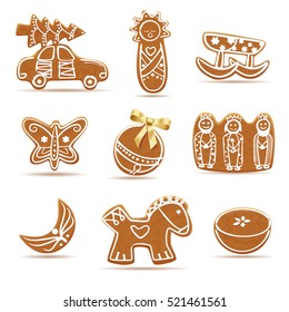 Assortment of delicious gingerbread cookies decorated with white frosting and shaped like various objects