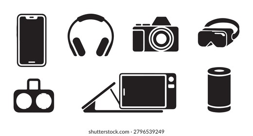 Assortment of digital consumer electronics like mobile phone headphones camera and virtual reality kit.
