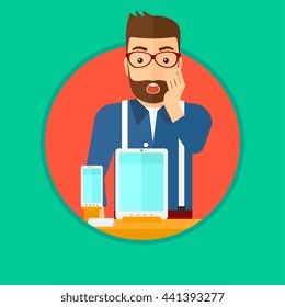 Astonished man looking at digital tablet and smartphone through the shop window. Man with open mouth looking at tablet and phone. Vector flat design illustration in the circle isolated on background.