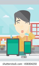 Astonished man looking at digital tablet and smartphone through the shop window. An asian young man with open mouth looking at tablet and phone. Vector flat design illustration. Vertical layout.