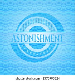 Astonishment light blue water style badge.